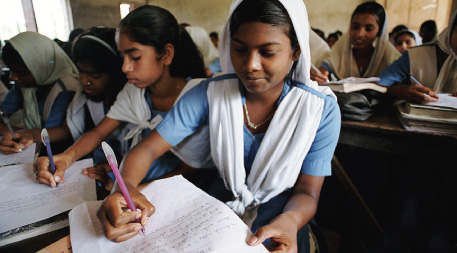 High school girls taking notes in Suapur, Bangladesh