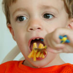 Child eating macaroni and cheese