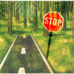 Road leading to the rain forest with stop sign in front