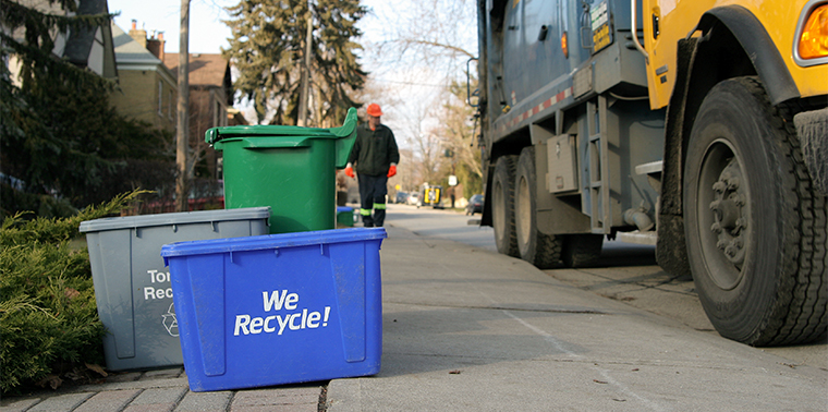 Curbside recycling bin and recycling truck