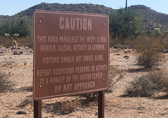 A sign warns visitors to Organ Pipe Cactus National Monument in Arizona