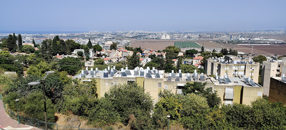 solar water heaters on top of buildings in Israel