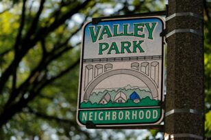 A sign that says "Valley Park Neighborhood"