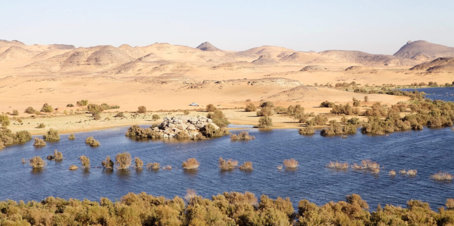 Mountains and desert along the shore of Lake Nasser, Egypt. Lake Nasser was created by the constraction of the Aswan High Dam